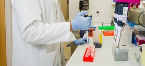 A lab tech administrating drug tests