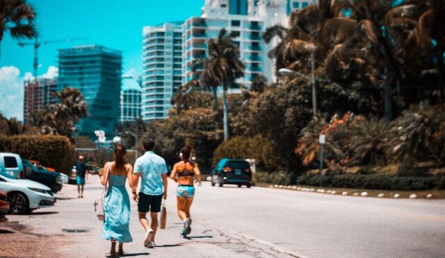 A photo of people walking down the street in Miami.