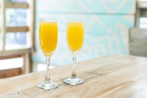  two glasses of mimosas