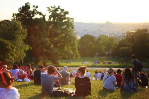 People sitting in a park and spending time with each other